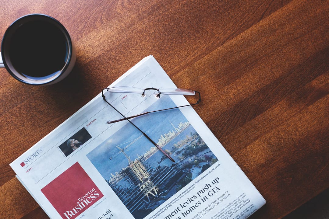 business newspaper coffee time scaled